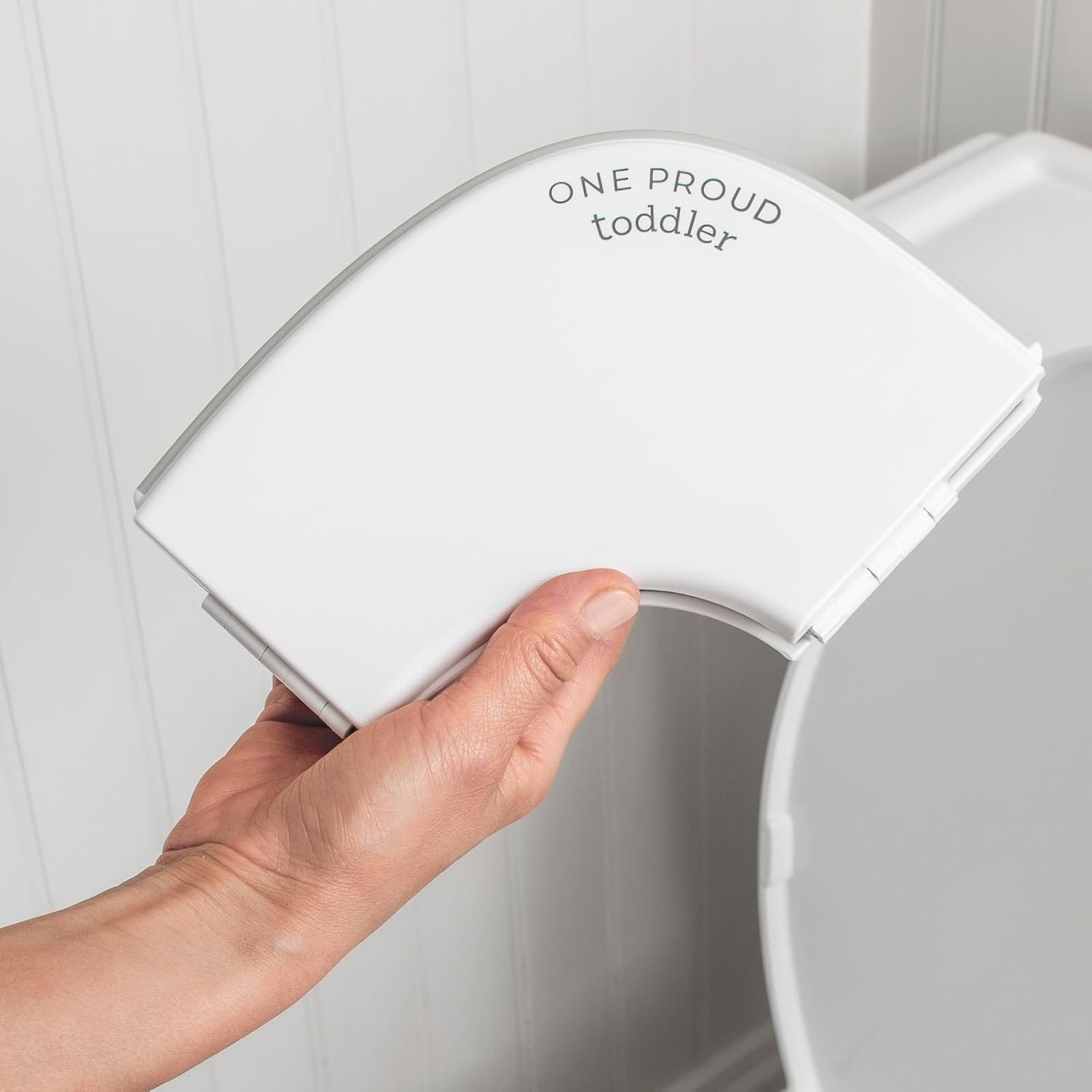 One Proud Toddler Premium Travel Potty Seat – Compact, Non-Slip, Made in USA Seat, No-Pinch Locking Hinges, Easy to Clean, Includes Machine-Washable Carry Bag